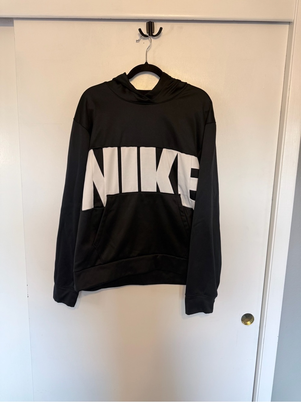 Nike Black Pullover Hoodie with White Spell Out logo
